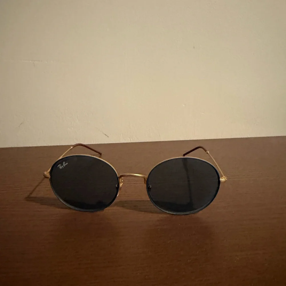 Ray-Ban Gold Frame Sunglasses with Black Lenses